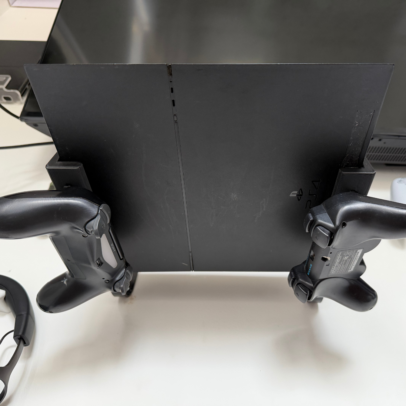 Soporte PS4 Slim horizontal de plástico y metal